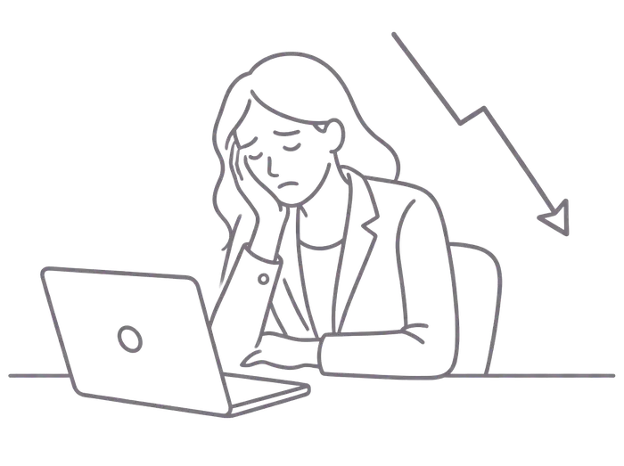 Unternehmerin sitzt unsicher vor dem Laptop